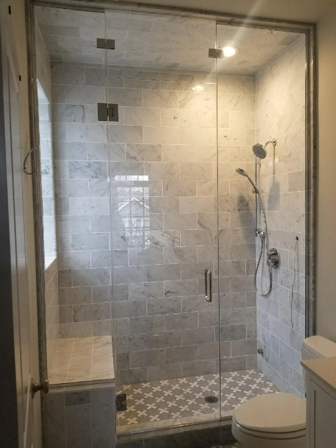 shower doors installed in modern bathroom